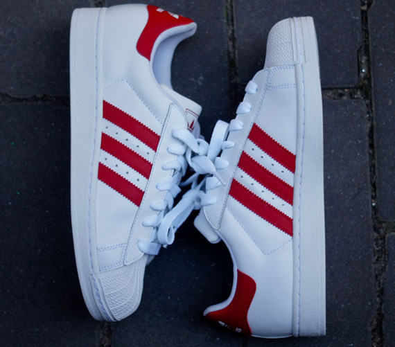 adidas white and red sneakers