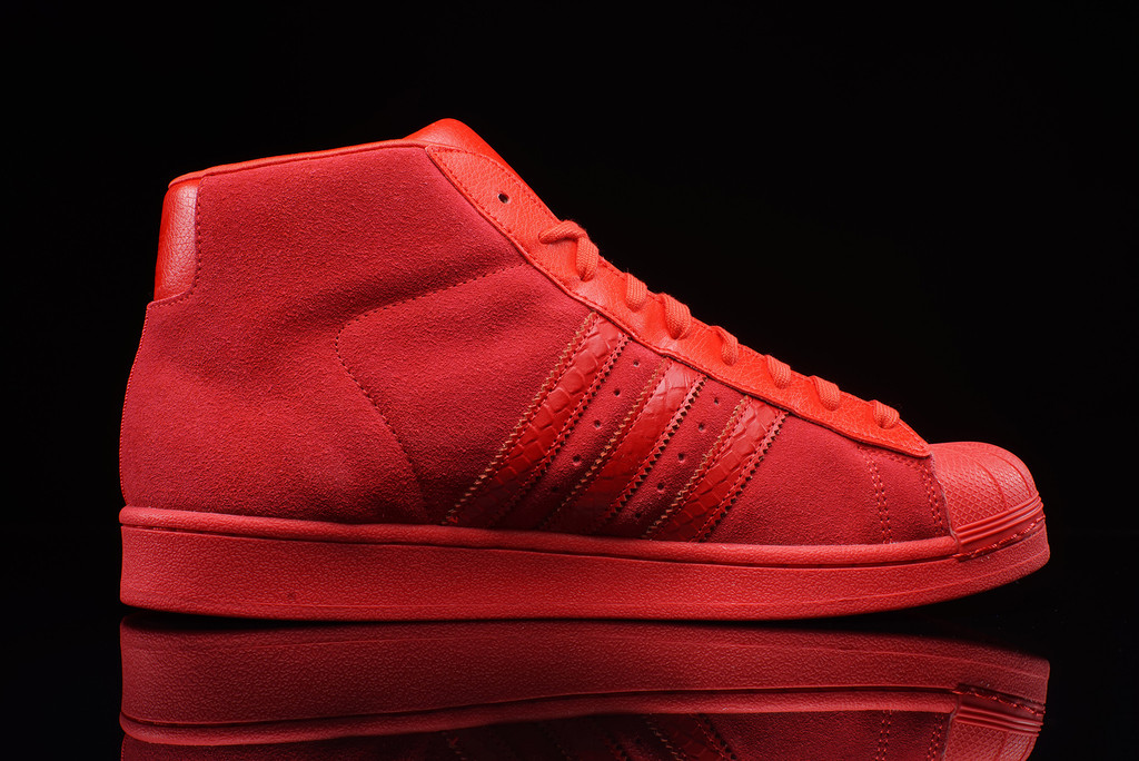 all red high top adidas