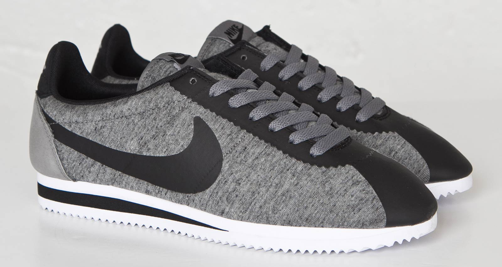 gray nike cortez shoes