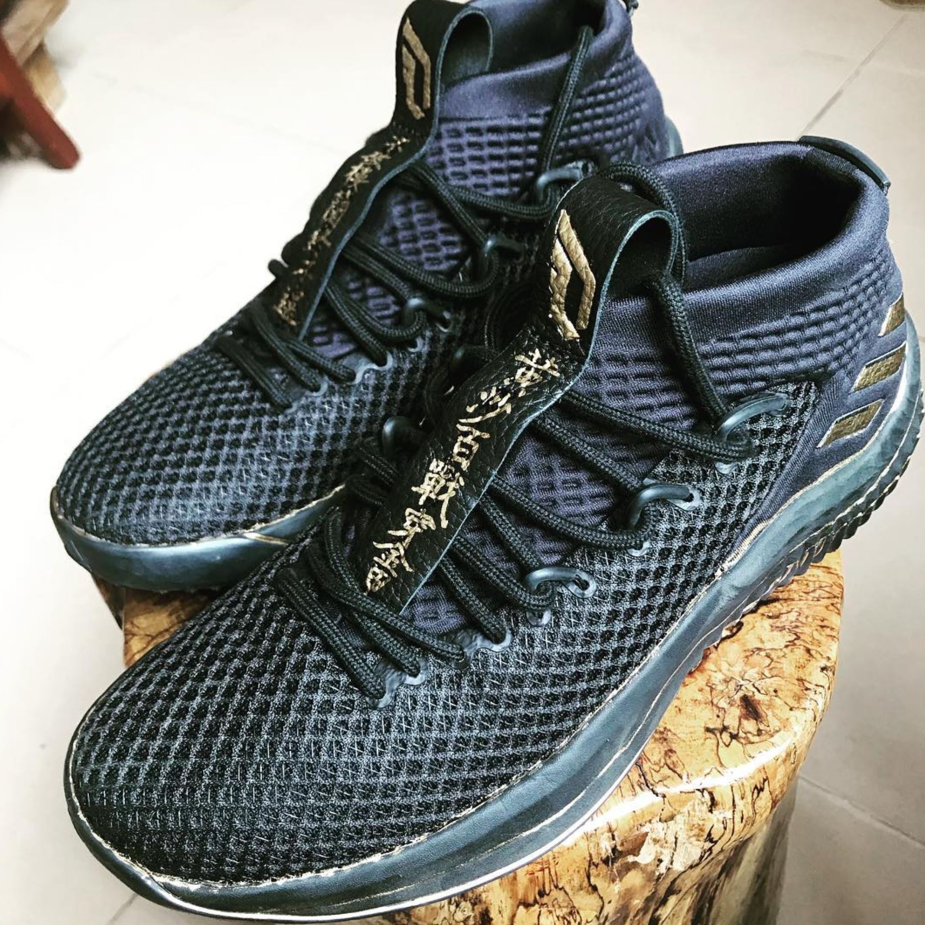 This adidas Dame 4 with Gold Chinese 
