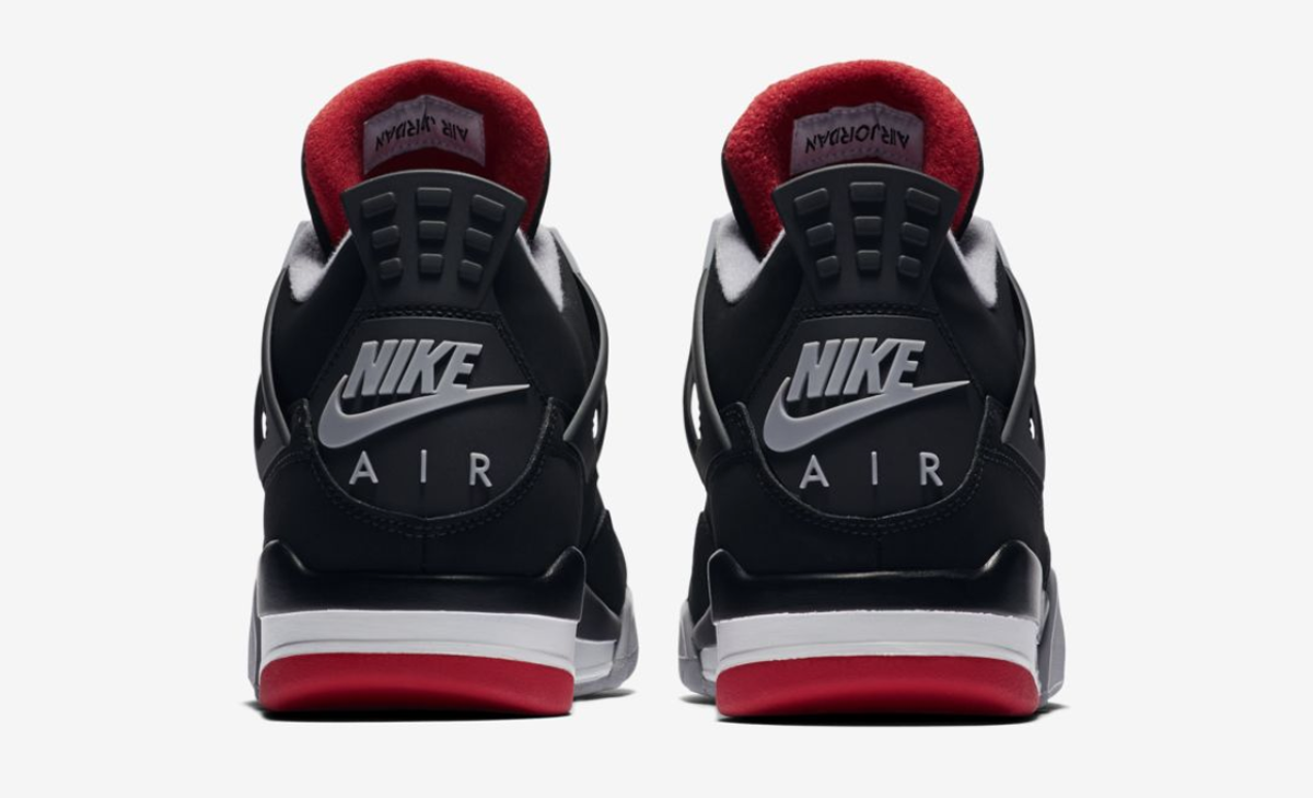 Nike Air Jordan 4 in Black/Cement 